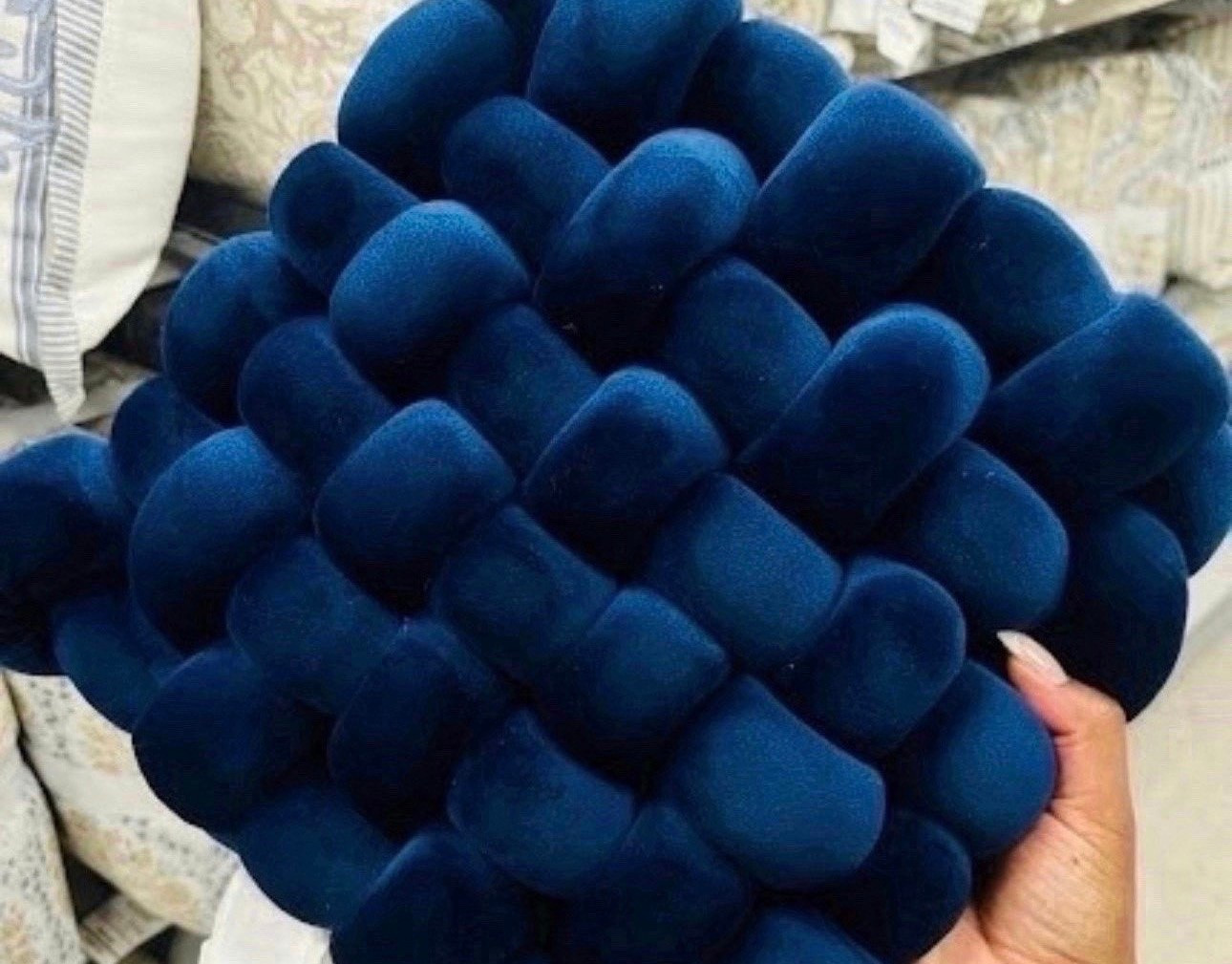 It’s all in the details! 💙 This deep navy woven knot pillow adds the perfect pop of color and texture to any sofa or bed. That velvet finish is incredibly soft and looks so expensive.

#LTKHome