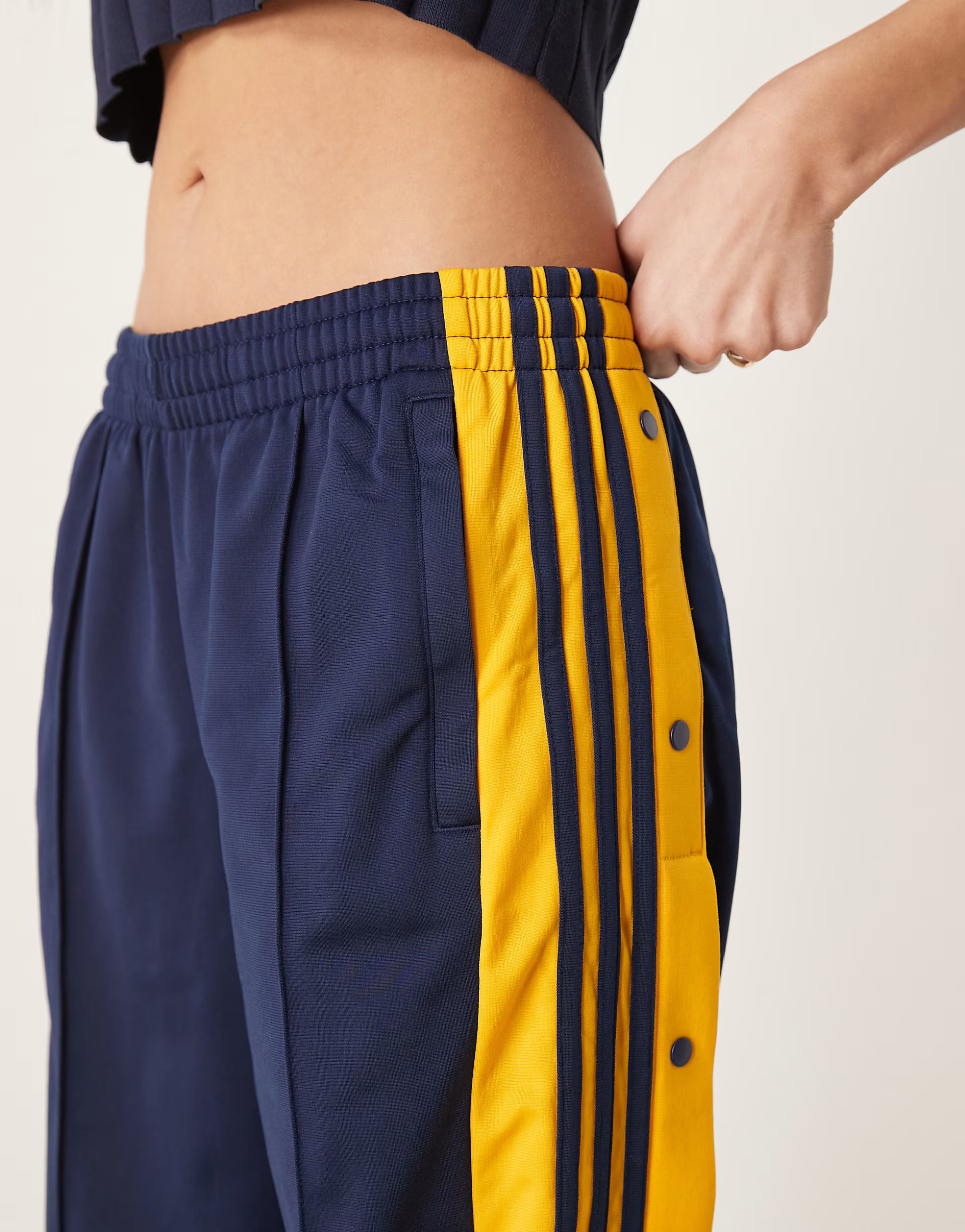 adidas Originals Adibreak track pants in navy and yellow | ASOS (Global)