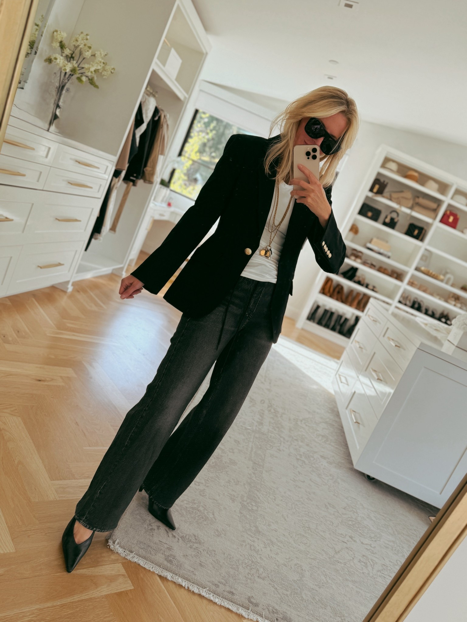 This look is super-sneaky comfy-chic. The blazer is a scuba material so there’s stretch without any wrinkles, and the jeans are actually sweatpants! Perfect when you want to be ultra comfy, but look polished. (A great travel outfit too—just swap the heels for sneakers.) 