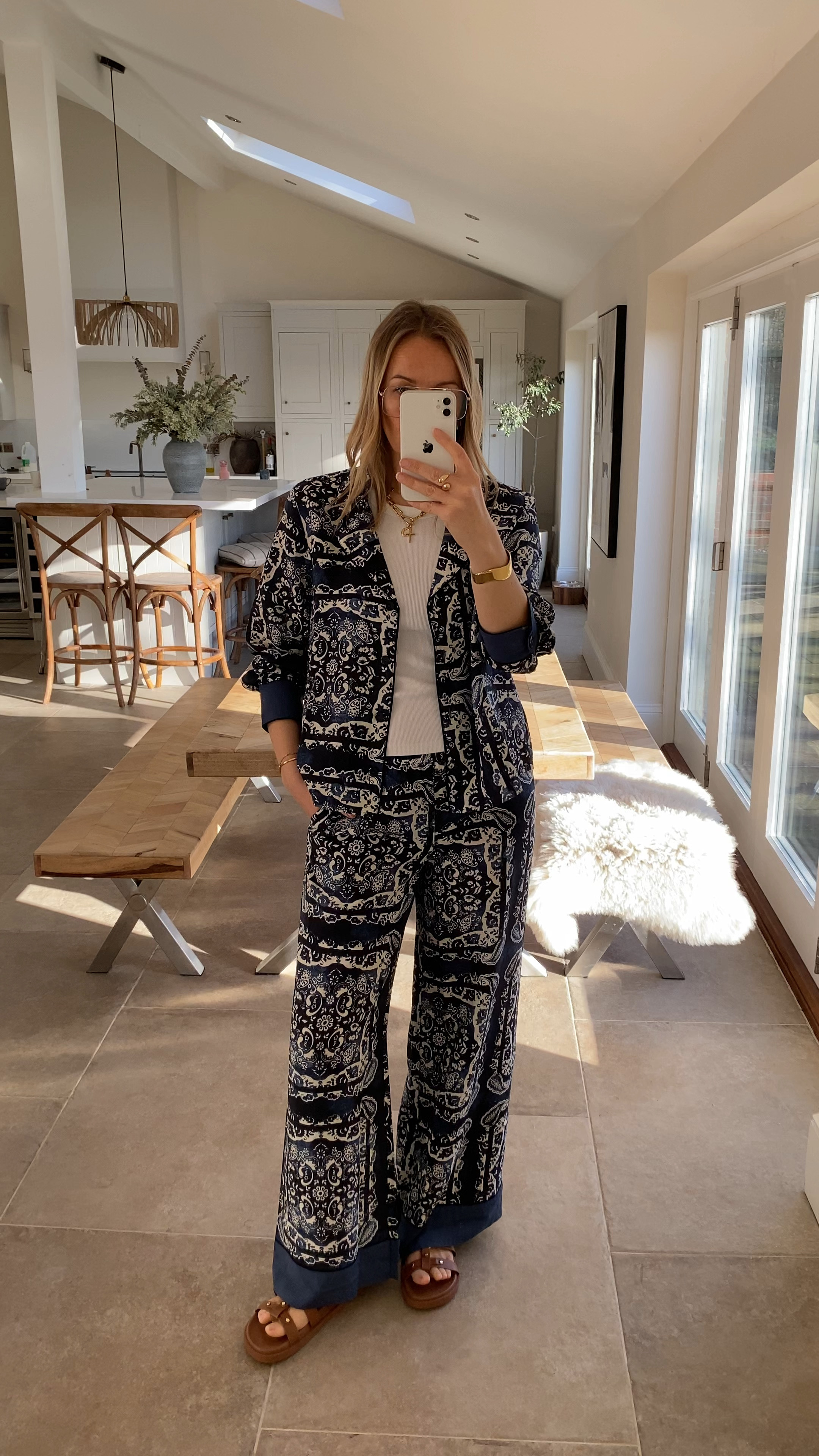 Adding a casual edge to the co ord with a white vest layer … 
Wearing a medium in the vest 
Medium in the co ord set 