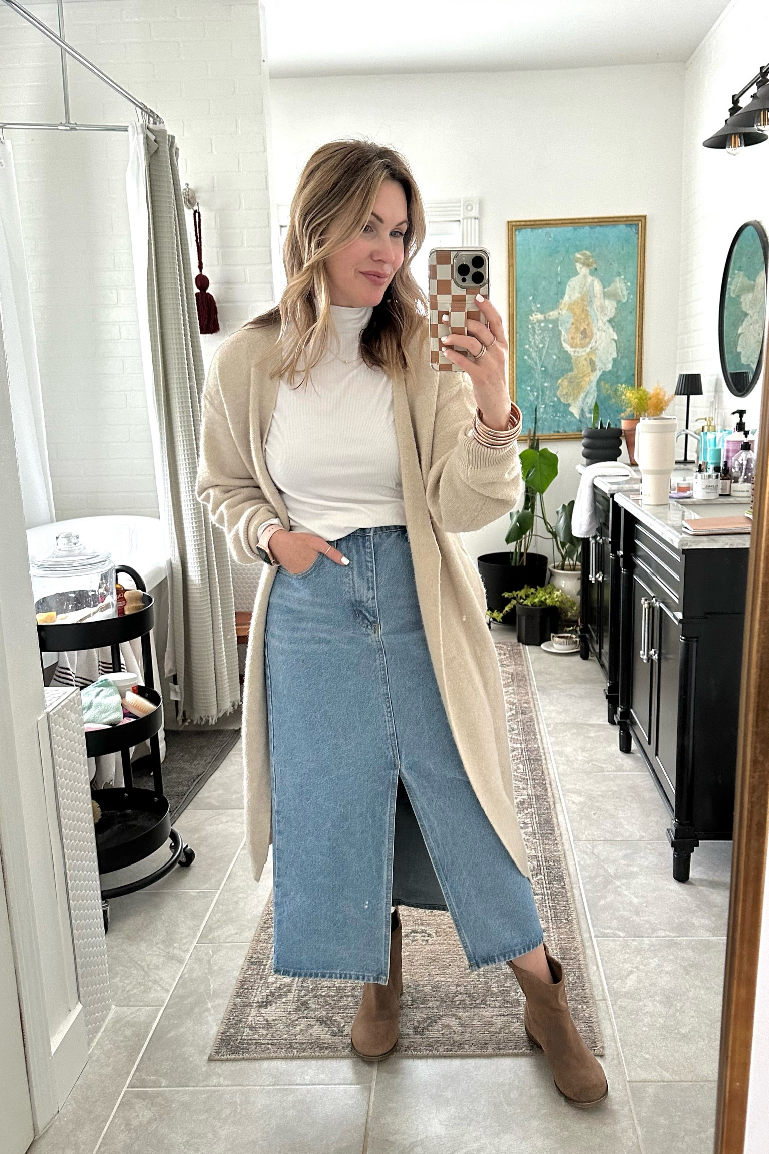 Love styling this denim skirt 
Long Coatigan 
White tee
Winter outfit
Church outfit
Long cardigan 
Women’s booties 
White tee


#LTKsalealert #LTKfindsunder50