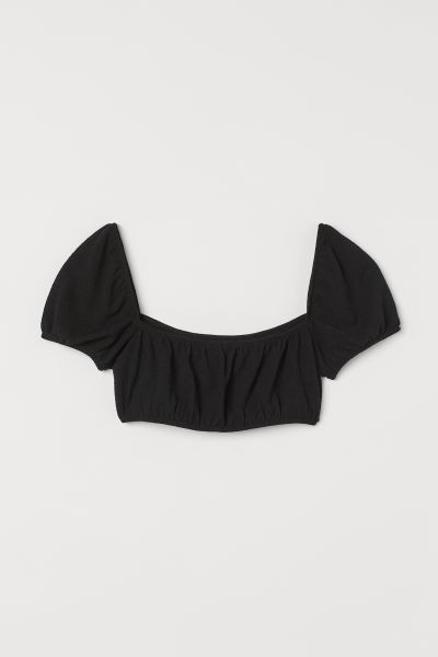 Off-the-shoulder crop top in soft jersey with short puff sleeves. Narrow, covered, elasticized tr... | H&M (US + CA)