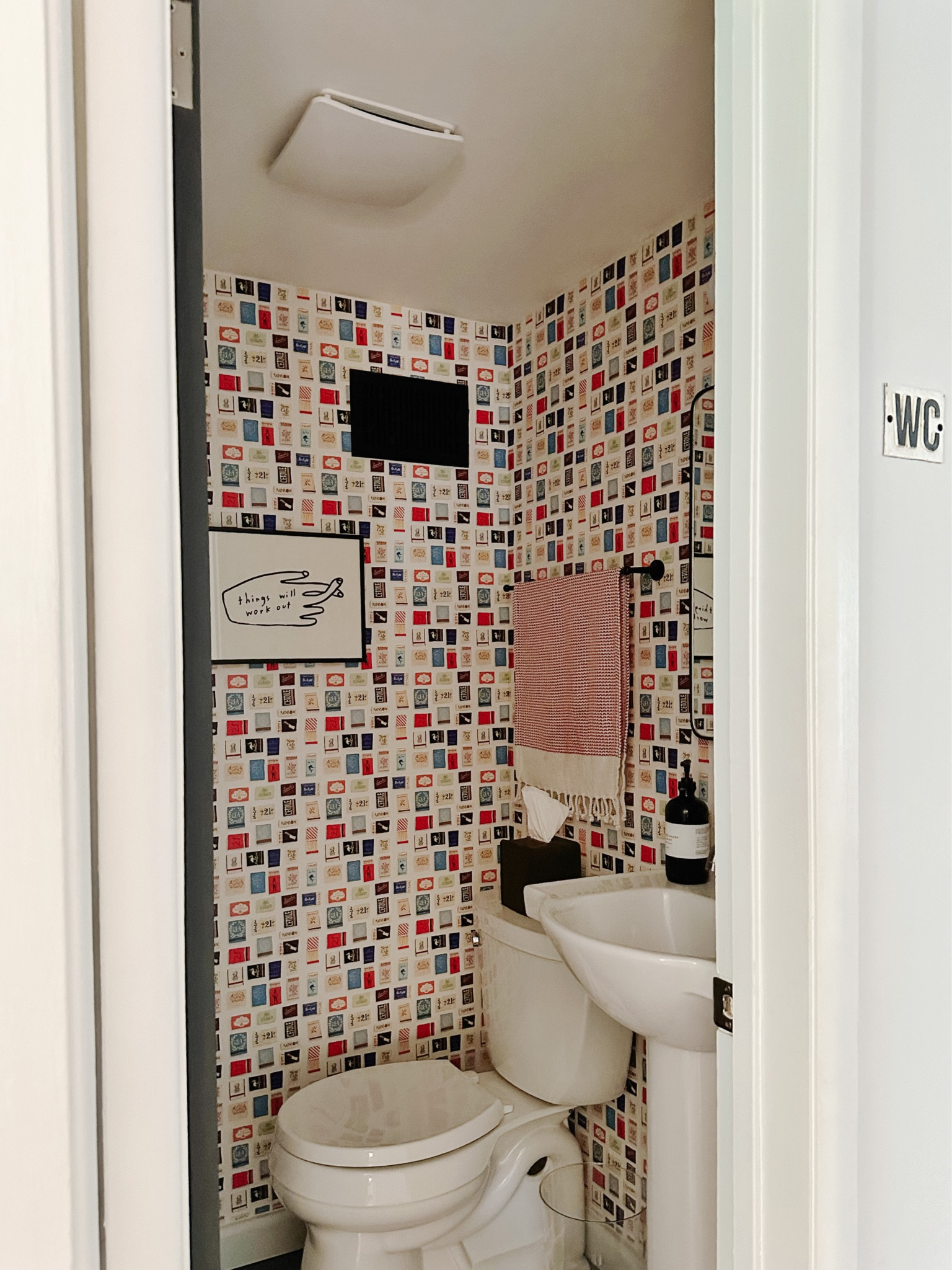 bathroom, hardware, hand towels, tissue box cover, decor, wallpaper, toilet, pedestal sink, mirror, light fixture, sconce, lightbulb, hand soap, home

#LTKunder50 #LTKfamily #LTKhome