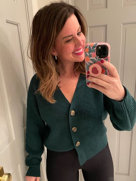 The perfect pine green cardigan. Looks high end - great quality! 