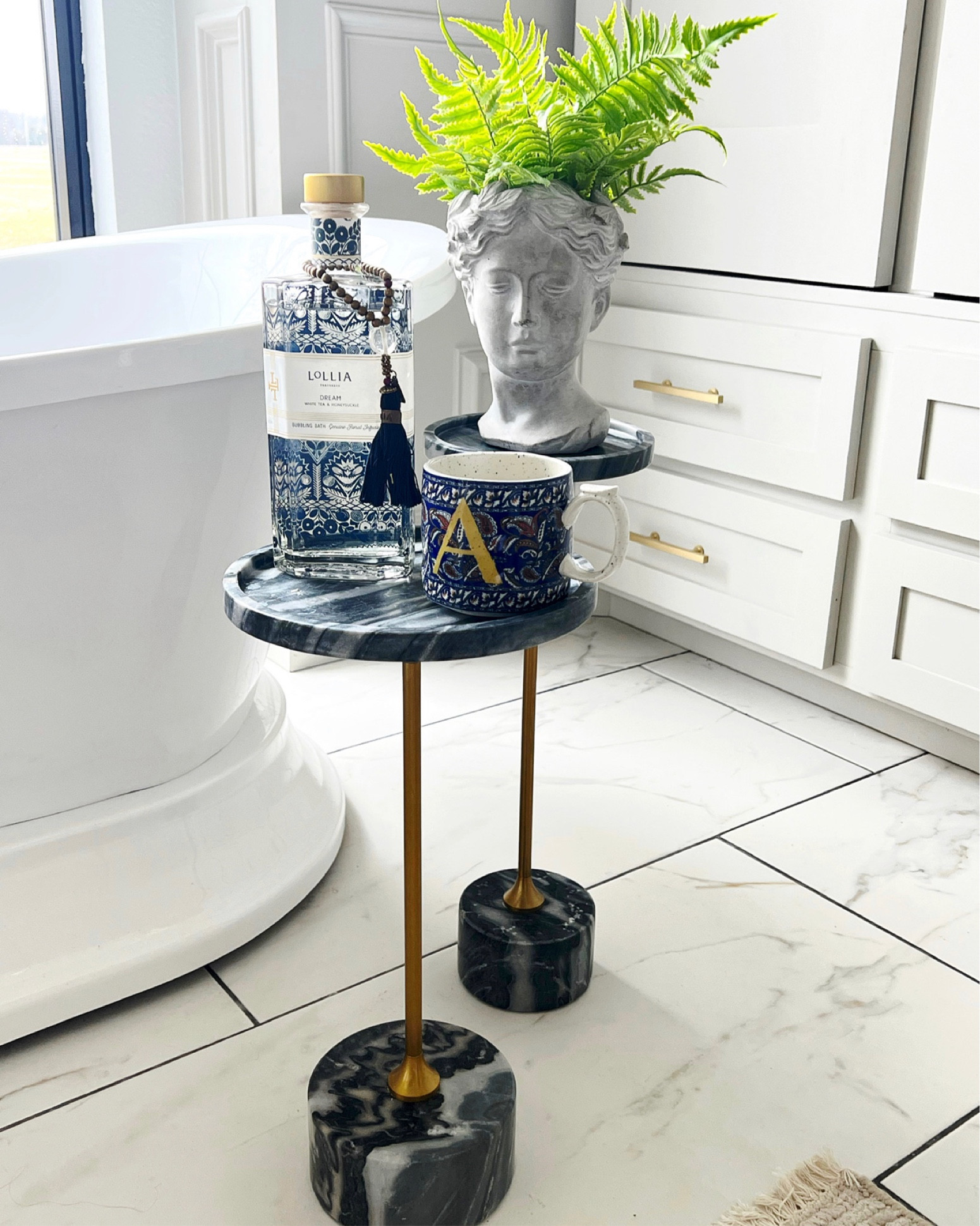 Black marble drink tables + Grecian bust. It’s all on sale

#LTKsalealert #LTKstyletip #LTKhome