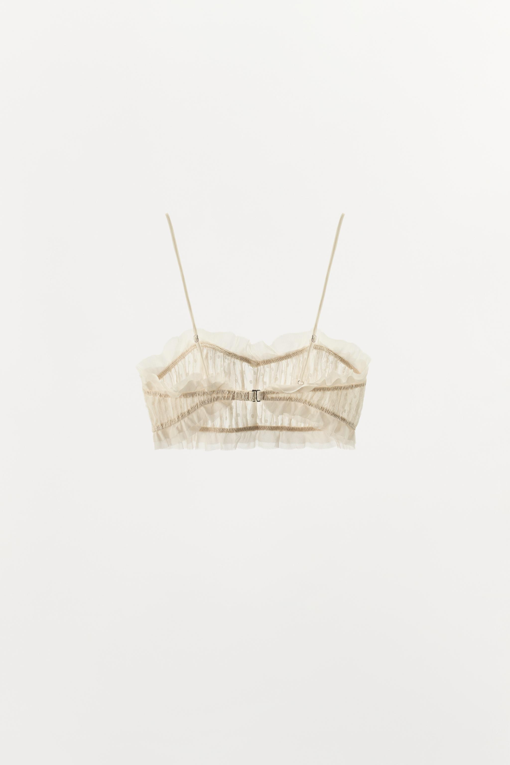 Sweetheart neckline bra with adjustable spaghetti straps. Featuring gathered detailing and mixed ... | Zara US