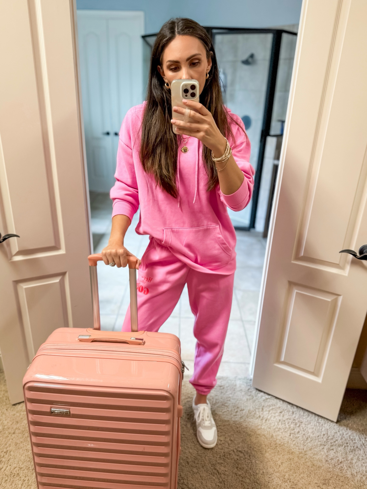 Travel day outfit 💖🎀👑 pink womens sweat set, bright pink sweat pants, bright pink oversized hoodie, pink luggage

#LTKTravel #LTKFindsUnder50 #LTKActive