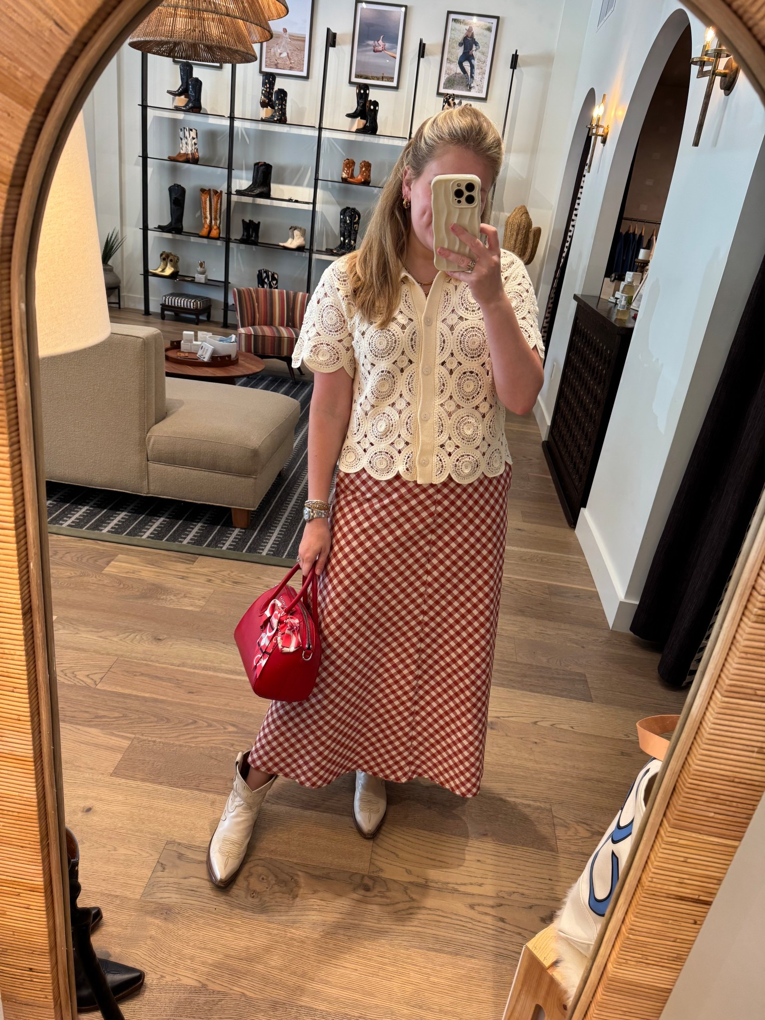 Crochet top
Red and white midi skirt
Red Givenchy bag
Cowboy boots 