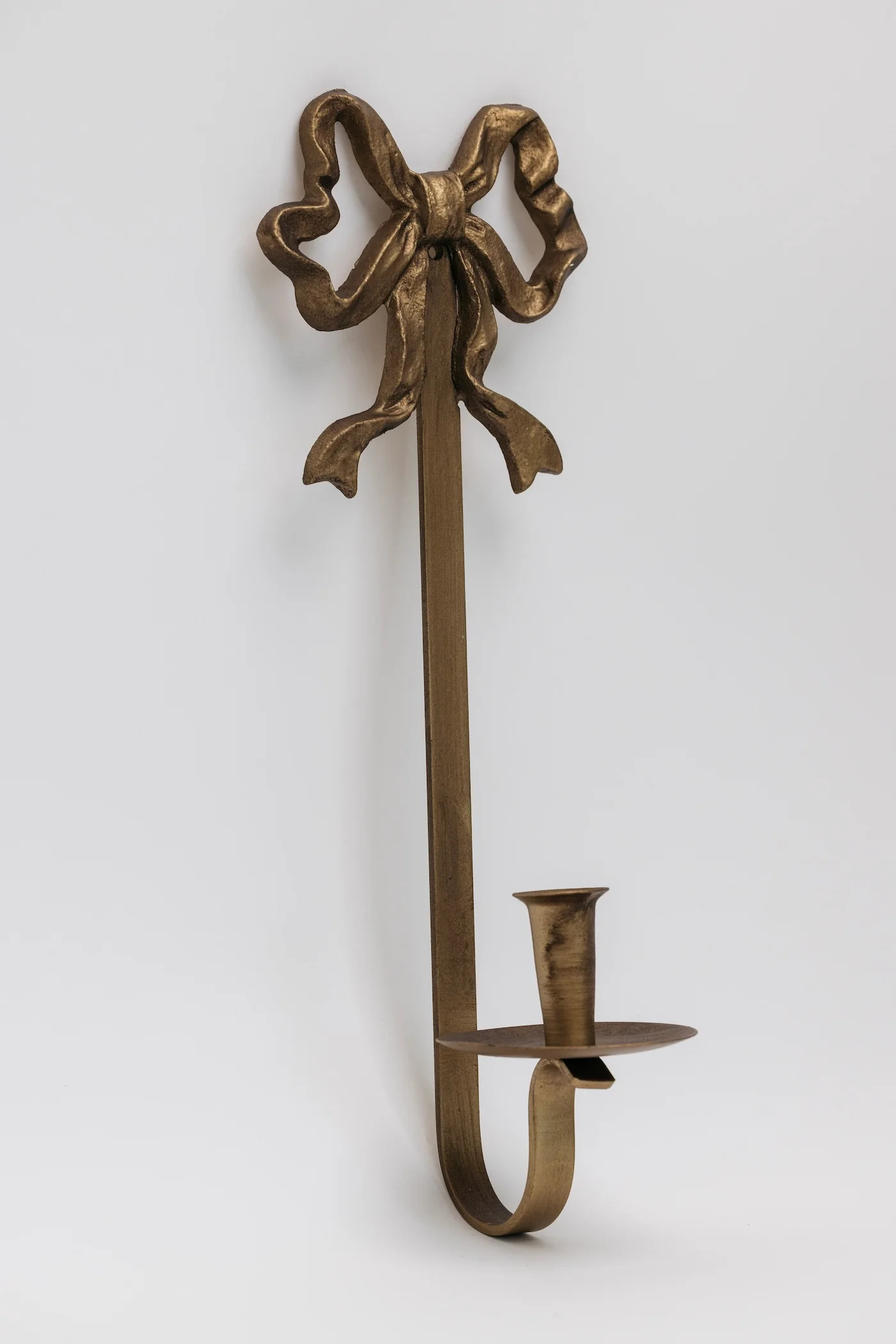 Gold Iron Bow Wall Taper Holder | THELIFESTYLEDCO