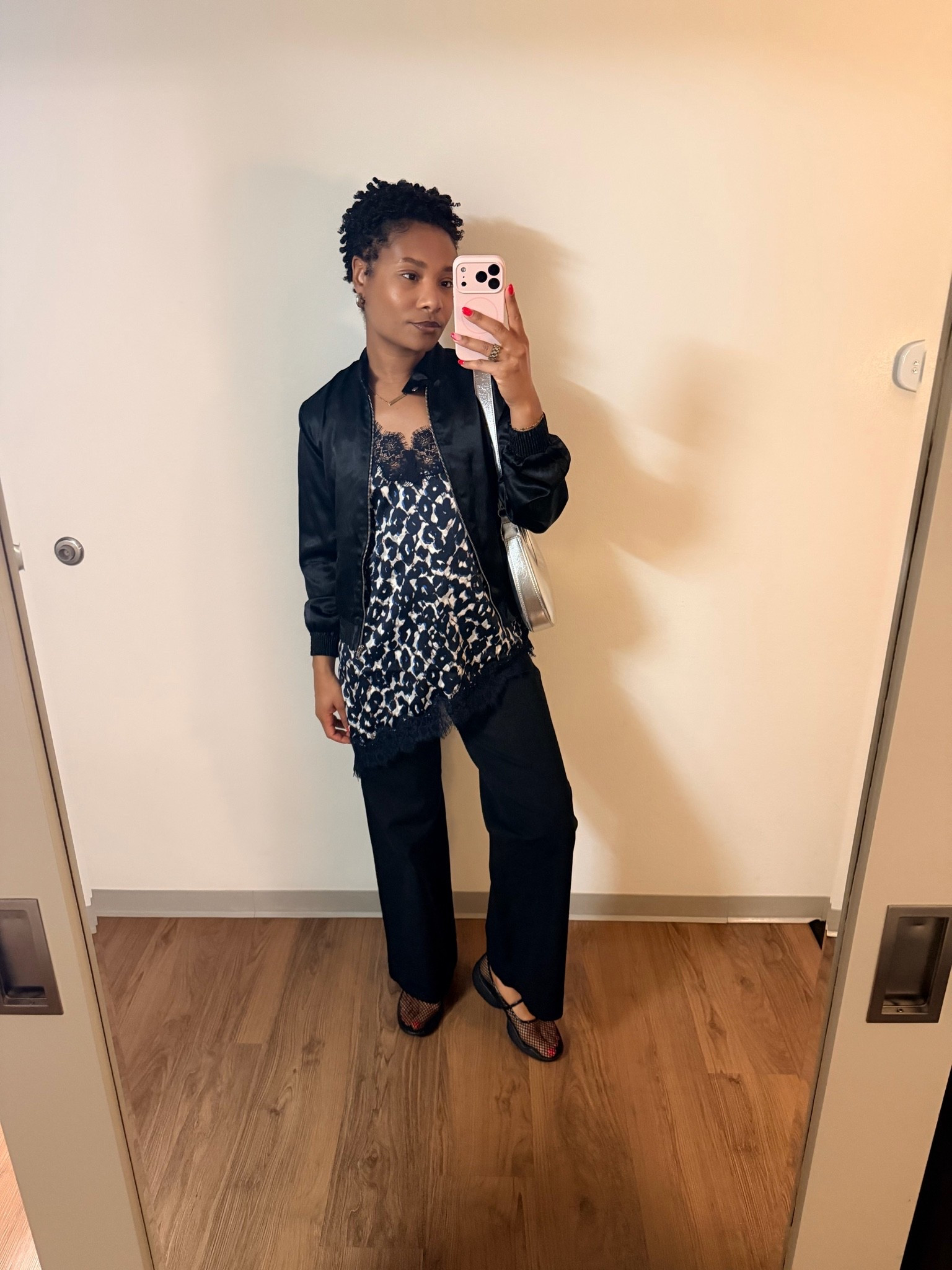 What I wore last night: Lace animal print tank, black wide leg jeans, black mesh shoes and  satin bomber. I also just grabbed this silver bag to add to my collection .

#LTKootd #LTKgrwm #LTKSeasonal
