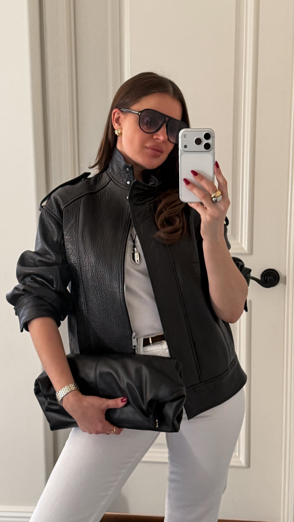 Styling a black leather bomber jacket with white denim and brown suede sneakers 
#jacket #leather #black #bomber #clutch #aviators 

#LTKSeasonal #LTKFindsUnder100 #LTKFindsUnder50