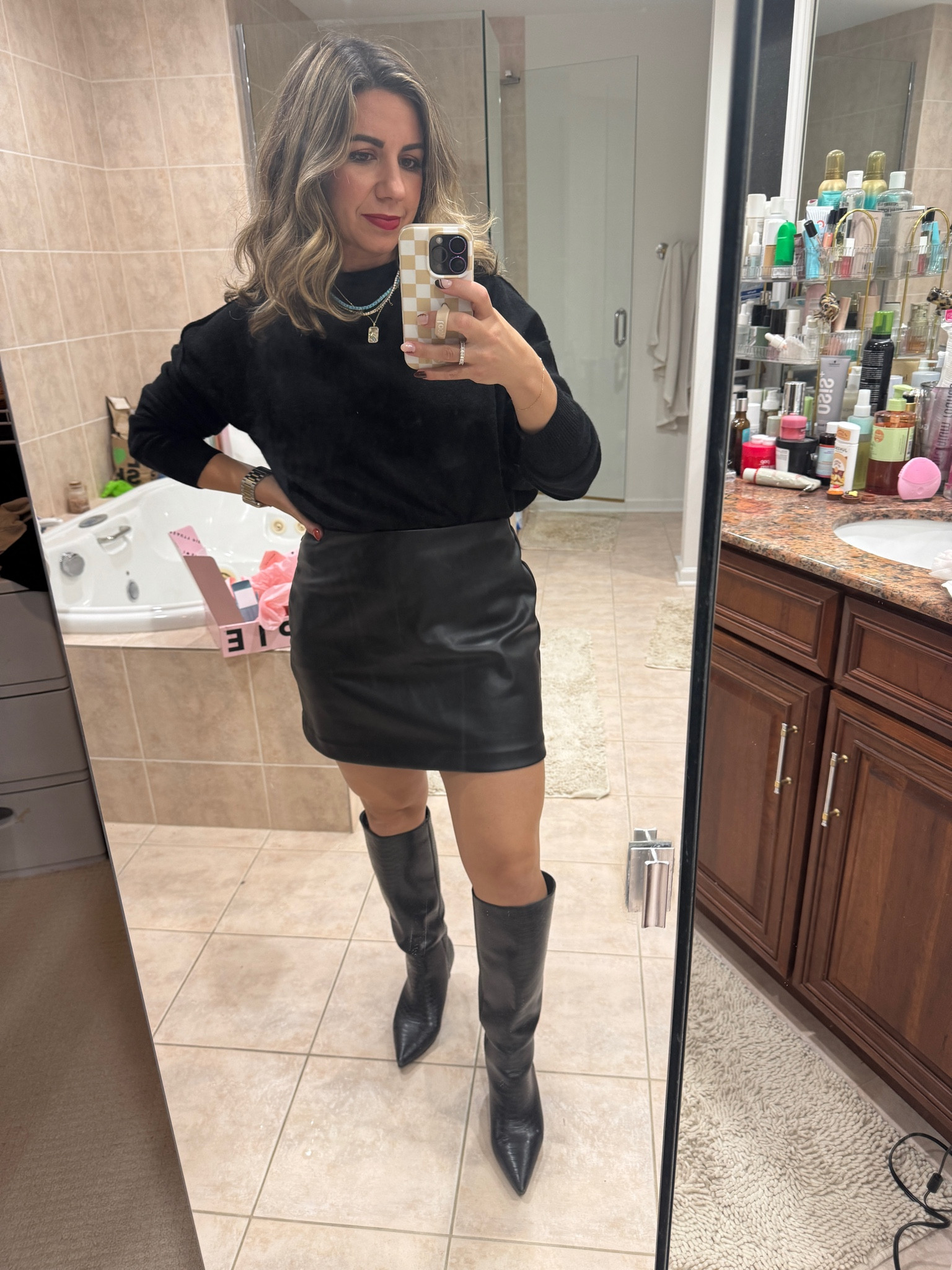 Date night outfit. Vegan leather skirt/skort (medium), old boots, and Anthropologie sweater in xs. 

#LTKFindsUnder100 #LTKStyleTip #LTKFindsUnder50