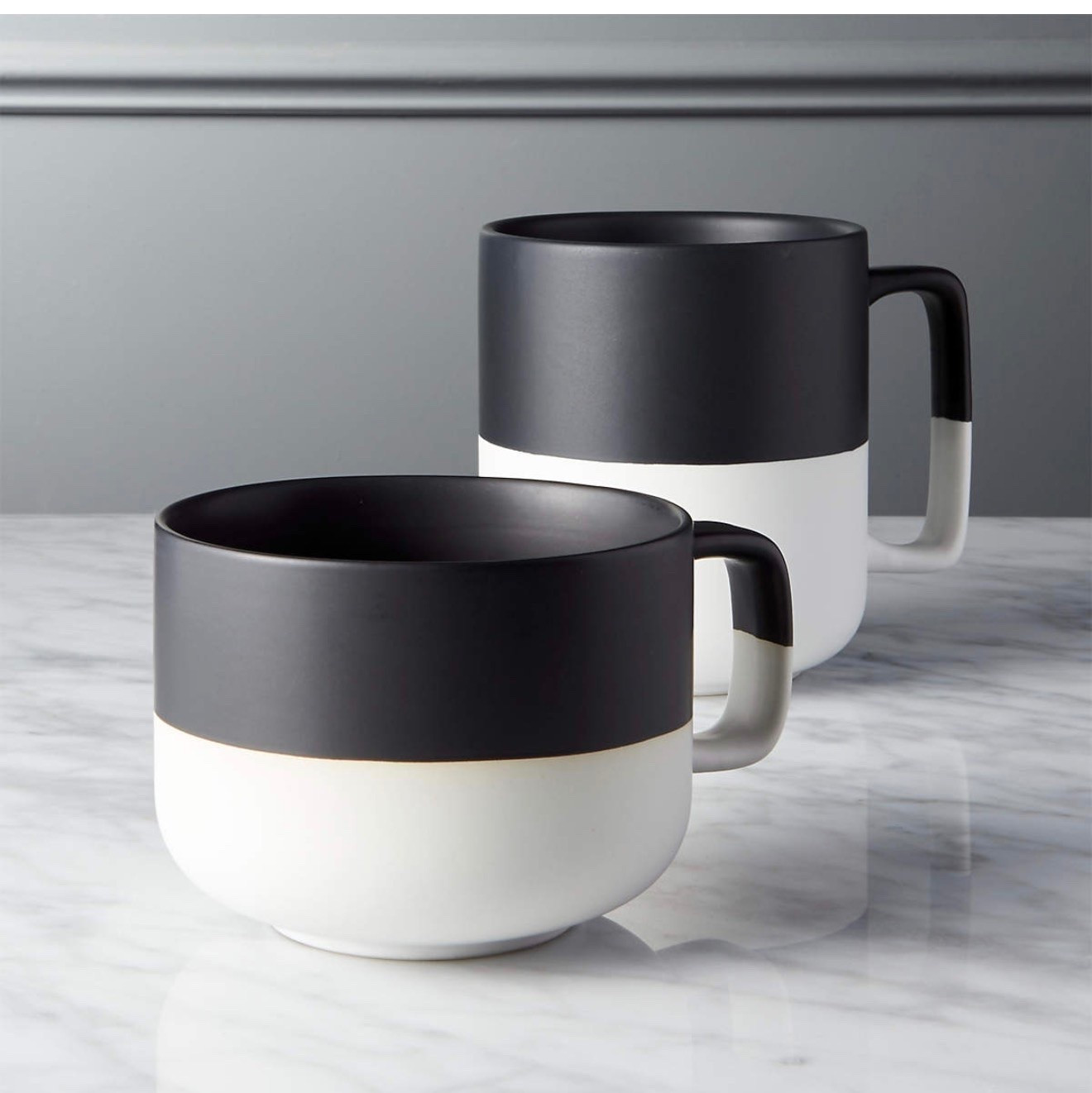 Black And White Ceramic Coffee Mug 19oz

Demi-dipped in a matte black glaze, oversized mug with square handle exposes the natural clay base to graphic effect. Perfect

#LTKMothersDay #LTKSeasonal #LTKHome