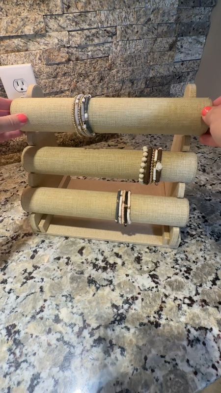 ✨ I absolutely LOVE this bracelet stand! It comes in 6 different colors and love the linen fabric on it! One row can hold up to 15-20 bracelets! You can even just take one of the rows off and bring it along in your suitcase to travel with! These bracelets are all top sellers in our Facebook group and under $10 a pack! 