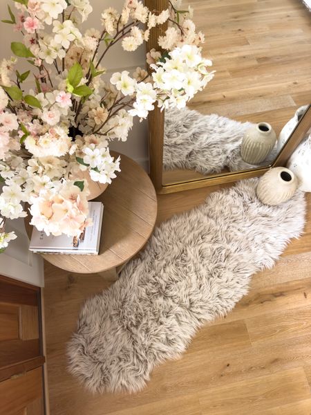 Spring entry way details! Not my usual style but I loved the cozy vibes this rug added for a winter to spring transition 

Home refresh, spring home, entry way details, Pottery Barn style, home finds, neutral home, aesthetic home, textured vase, rug details, faux florals, found it on Amazon, furniture favorites, wooden furniture, decor book, light and bright, pops of pink, neutral wood tones, creamy whites, floor mirror, gold detail, shop the look!

#LTKSeasonal #LTKhome #LTKstyletip