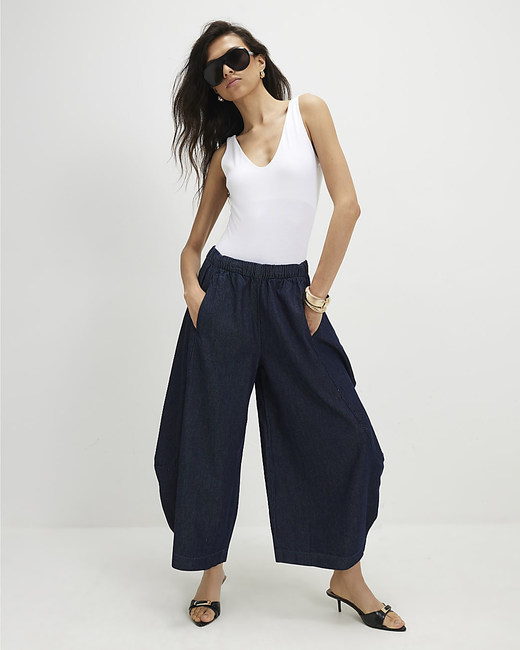 Blue Elasticated Horseshoe Barrel Leg Jeans | River Island UK & IE