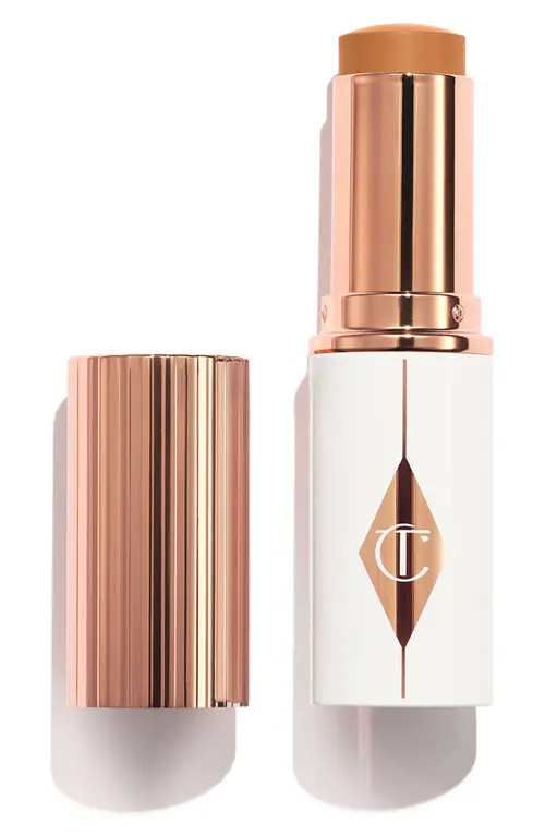 Charlotte Tilbury Unreal Skin Sheer Glow Tint Hydrating Foundation Stick in 12 Tan at Nordstrom | Nordstrom