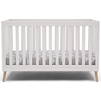 Delta Children Essex 4-in-1 Convertible Baby Crib, Bianca White with Natural Legs | Amazon (US)