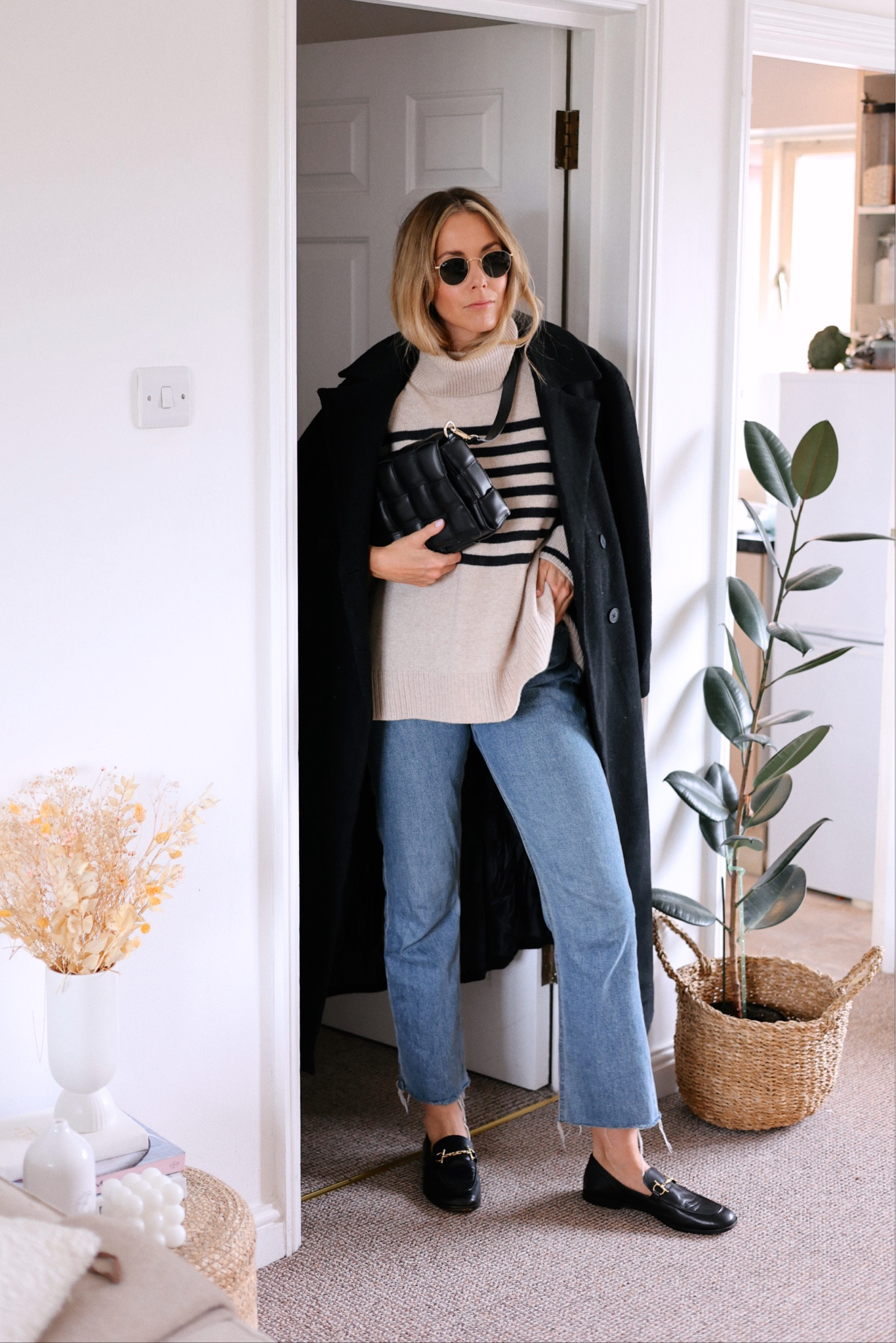 Striped wool jumper
Striped knit 
Black coat 
Straight Jeans 
Leather loafers 
Quilted bag 

#LTKSeasonal #LTKstyletip #LTKeurope