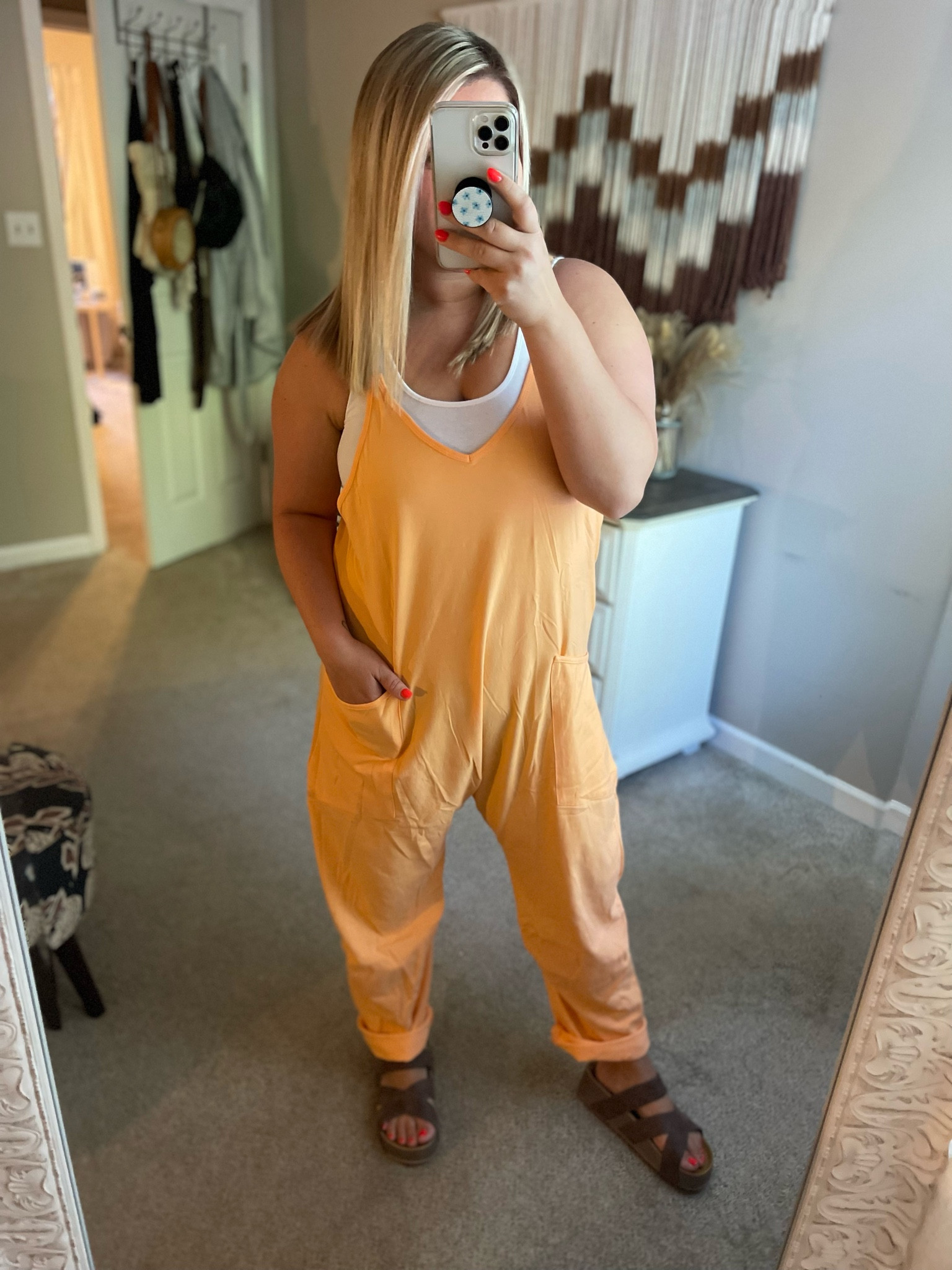 Such a fun spring and summer outfit! I love this romper for me because it hides that mid section where I am most insecure! I rolled the ankles for some texture and this will go with so many different style shoes and bags! Would be cute for the baby bump as well!! I am 5’4 200 lbs wearing the size large in both the romper and crop top 

#LTKfindsunder50 #LTKSeasonal #LTKstyletip
