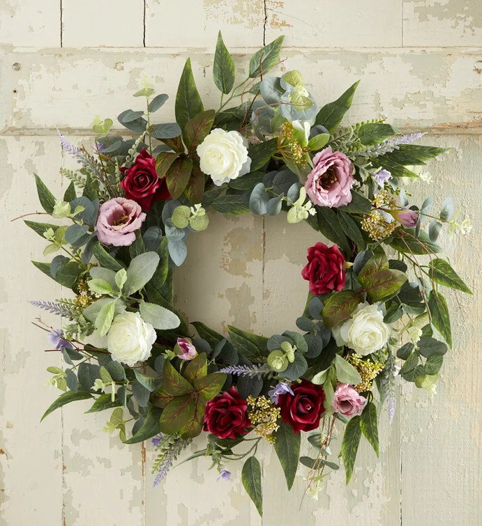 Welcome family and friends for spring with our Victorian-inspired wreath. Authentic faux roses in... | 1800flowers.com