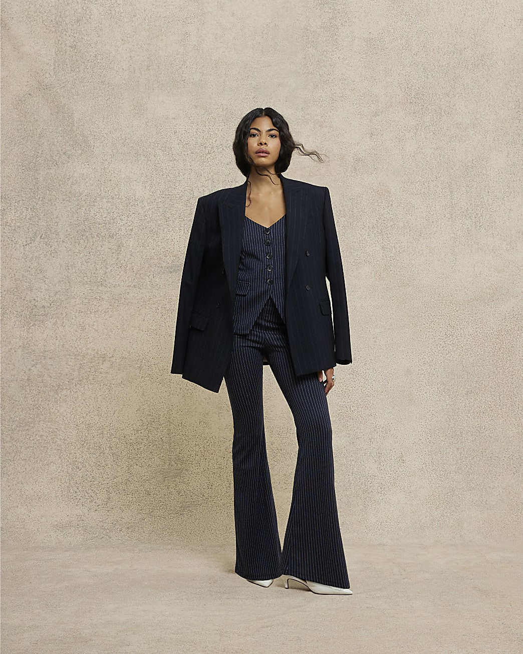 Navy Pinstripe Flared Trousers | River Island UK & IE