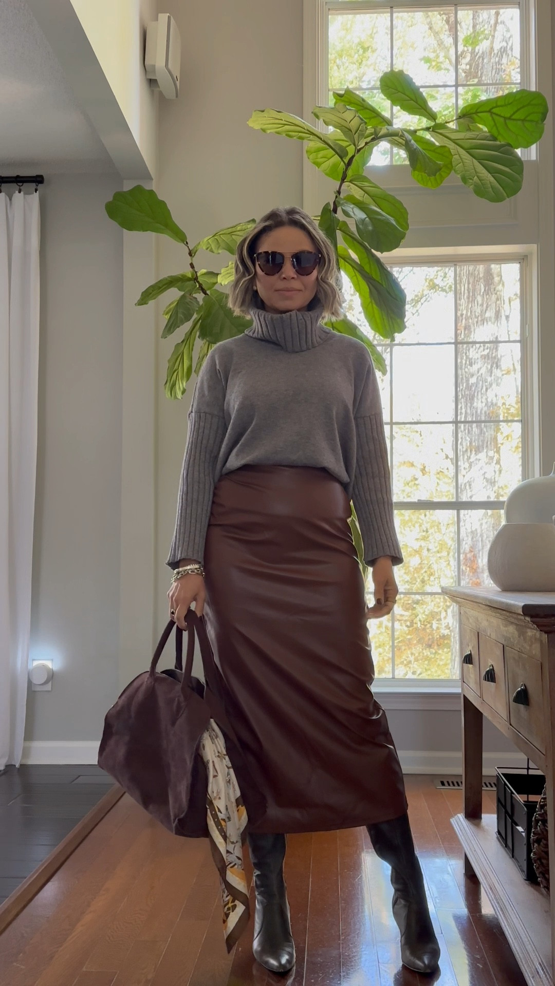 Fall outfit, faux leather midi skirt paired with oversized grey sweater boots and chocolate brown bag 

#LTKPetite #LTKOver40 #LTKSeasonal