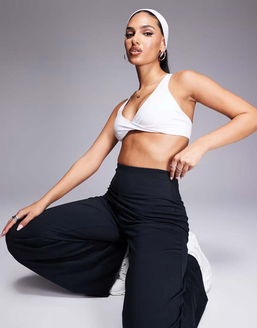 4505 soft touch light support twist front sports bra in white | ASOS (Global)
