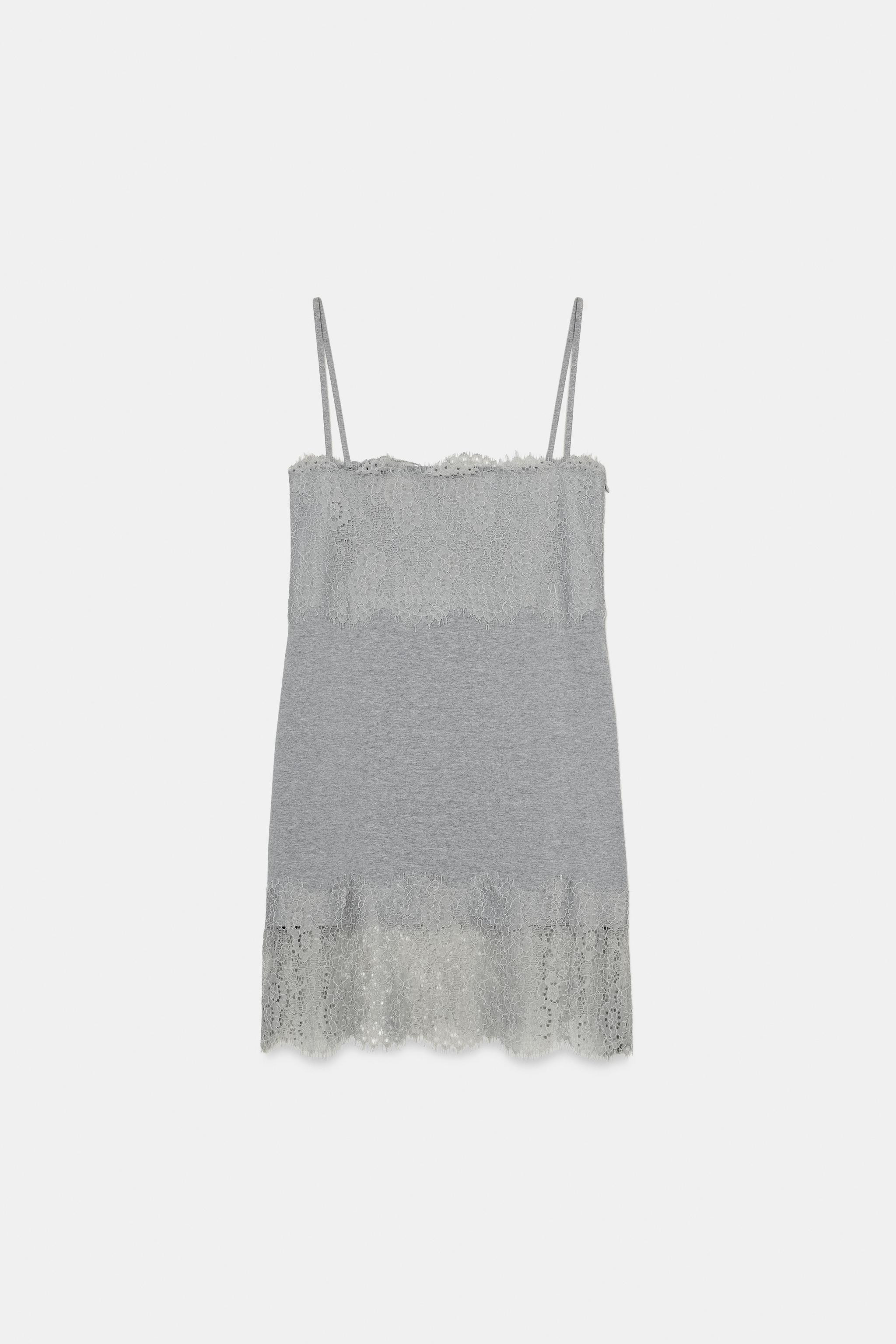 Dress made from a cotton blend yarn. Straight neckline and spaghetti straps. Tonal lace trim deta... | Zara US