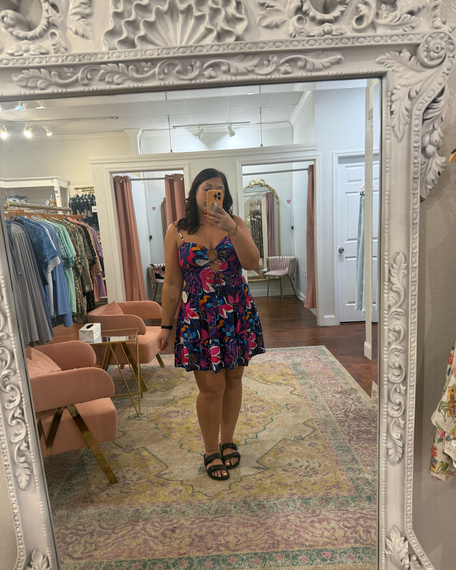 Serving tropical vacation energy in the cutest mini dress! 🌺☀️ I love the colorful print, flattering fit, and adjustable front tie—it’s the perfect throw-on-and-go look for vacations, brunch, or summer date nights. Just add sandals and you’re ready for summer! 💙✨ 

Wearing a size large in the dress.

#LTKMidsize #LTKTravel #LTKdayinmylife