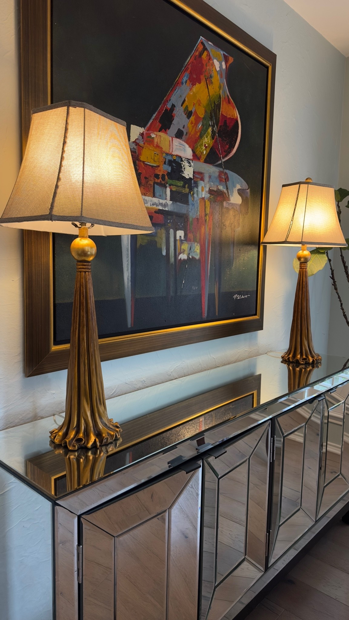 I get asked about these lamps from time to time. I bought them at a home consignment shop and I think the original owners switched out the lampshade but this is the exact lamp minus the shade love them! They are meant to look like hanging tassels

#LTKHome