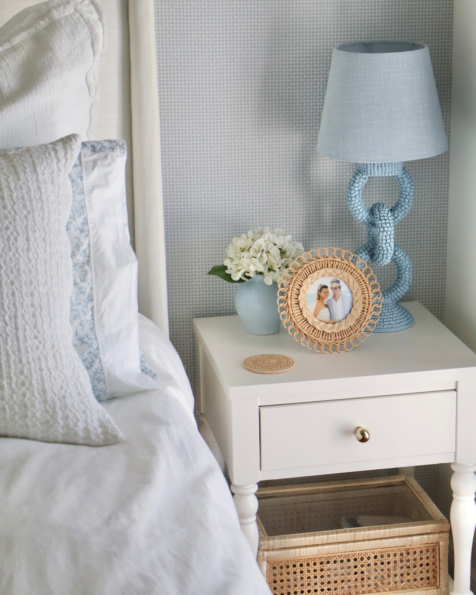 Coastal bedroom decor inspiration 🤍 This serene nightstand features layered white bedding, soft blue accents, a whimsical table lamp, and timeless coastal home decor details. Linking all my bedside styling favorites for an elevated, calming bedroom look.

coastal bedroom decor, coastal nightstand, blue and white bedroom, neutral bedroom decor, bedside table styling, coastal home decor, woven bedroom decor, beach house bedroom, modern coastal bedroom, bedroom decor ideas

#LTKFindsUnder50 #LTKFindsUnder100 

#LTKHome