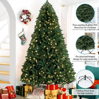 6.5 ft. Spruce Prelit Artificial Christmas Tree with Foot Pedal, 1197 Branch Tips, 450 Warm Lights and Metal Stand | The Home Depot