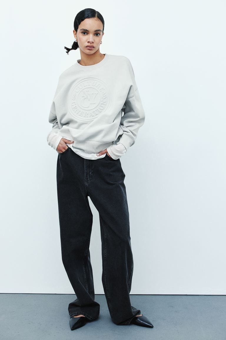 Oversized sweater met motief | H&M (DE, AT, CH, DK, NL, NO, FI)