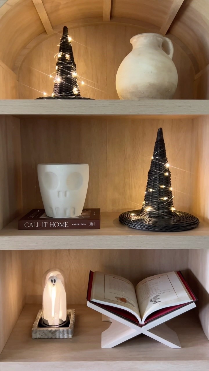 Halloween decor for my arched cabinet ✨ I added twinkle lights to the rattan witch hats for some extra glow! I found some similar pre let hats from Amazon too ✨

#LTKSeasonal #LTKHome