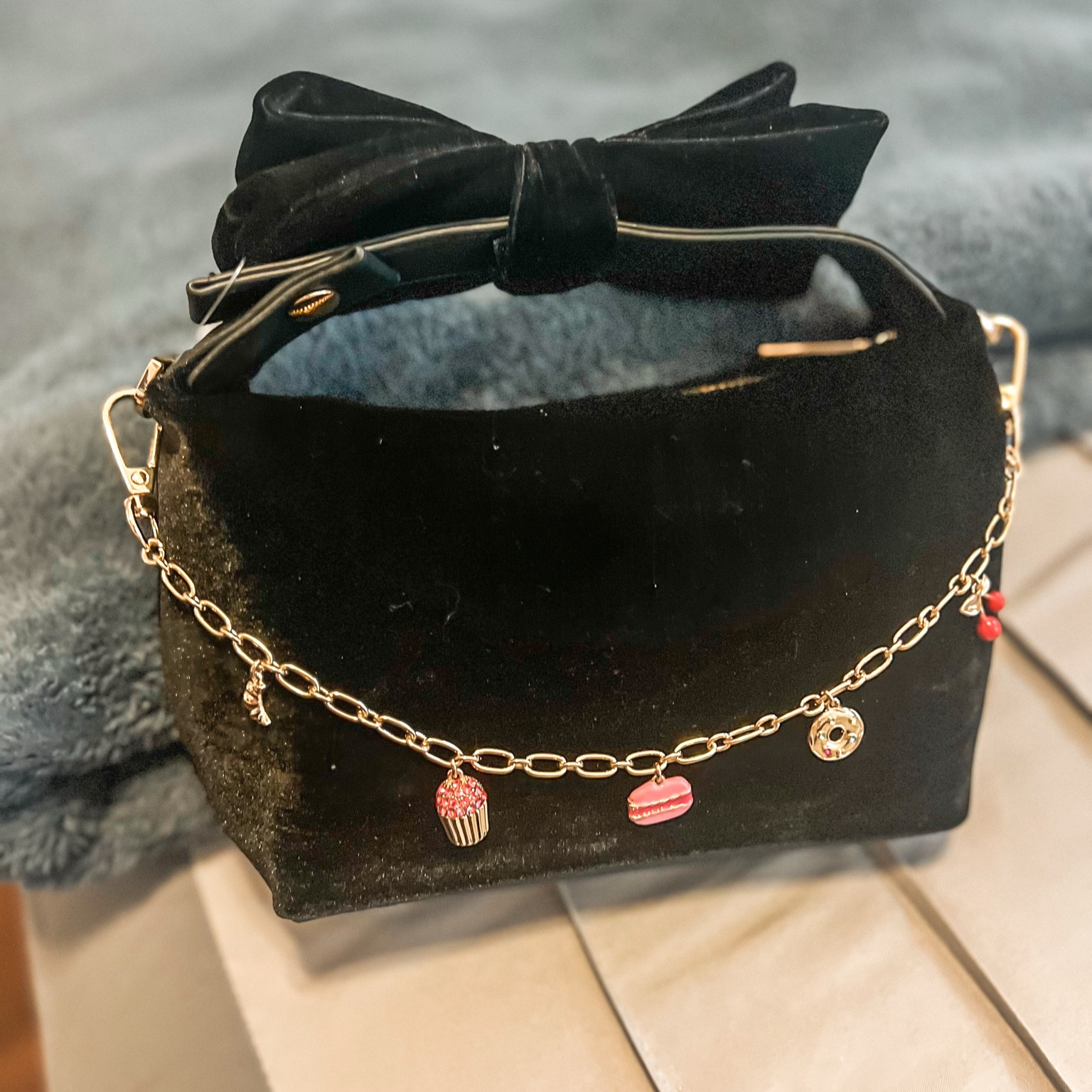 The perfect holiday date night bag.   Add a charm to make it unique and more glam.  #holidaybag #blackbag #bowbag 

#LTKHoliday #LTKSeasonal #LTKItBag