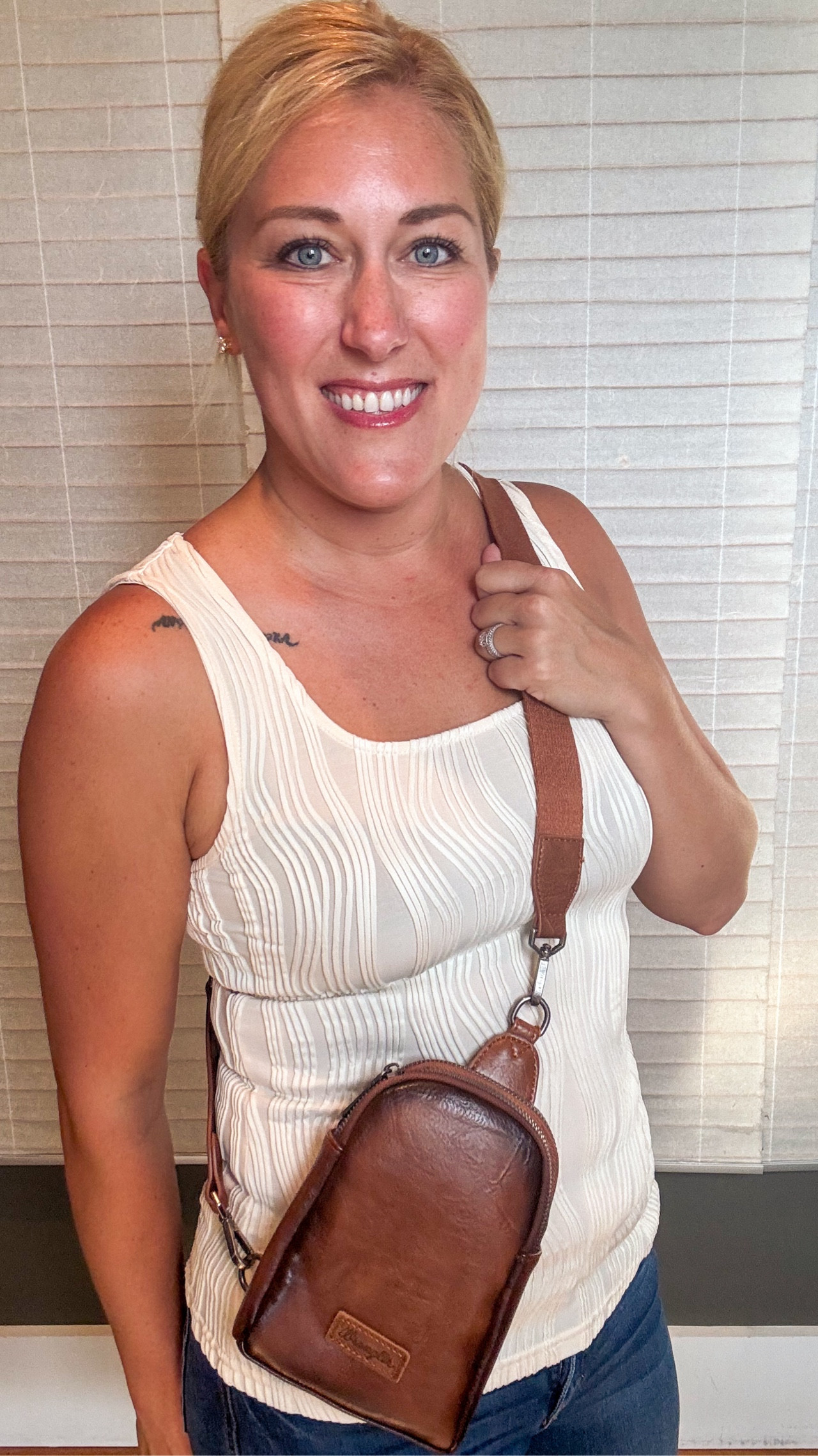 I’m blown away by the quality and cuteness of this Wrangler crossbody sling bag! This is true quality leather, has two large zip pockets with cardholders inserted, and a reversible strap so you can wear it whichever way you’d like. 

#LTKStyleTip #LTKOver40 #LTKItBag