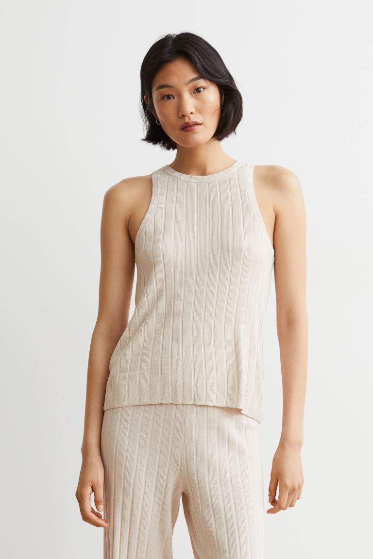 Conscious choice  New ArrivalTank top in a soft, fine, rib-knit viscose blend. Narrow cut at top.... | H&M (US)