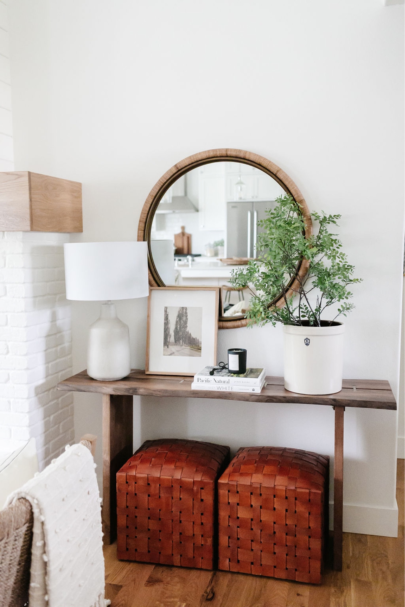 The perfect neutral console table decor  
World Market console table, McGee & Co leather ottomans, Lulu & Georgia table lamp, Amazon, home decor, Pottery Barn wood gallery frame, faux greenery 

#LTKstyletip #LTKSeasonal #LTKhome