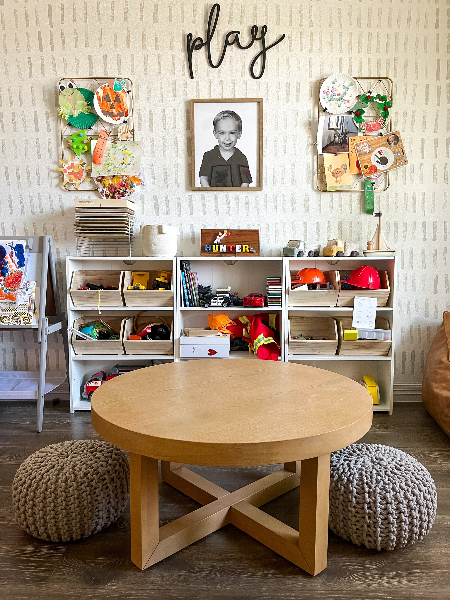 Playroom with Target coffee table as play table with woven poufs for play chairs  

#LTKfamily #LTKkids #LTKhome