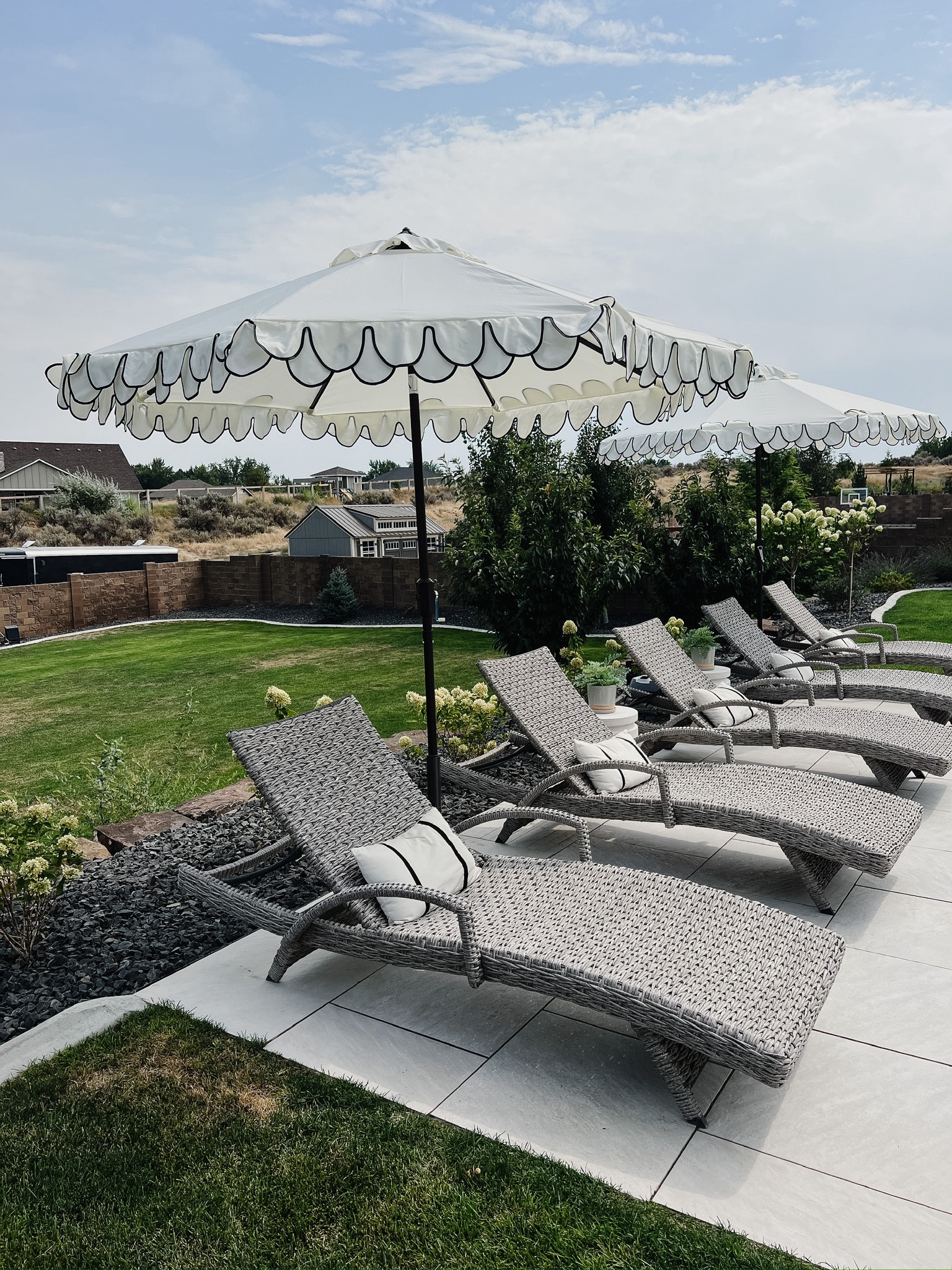 These beautiful scalloped umbrellas are one of my favorite outdoor pieces! I love the detail, the black trim, and the price point is great for the quality too. They’re 56% off right now, and they always sell out super quickly each season too! 

#LTKsalealert #LTKhome #LTKSeasonal