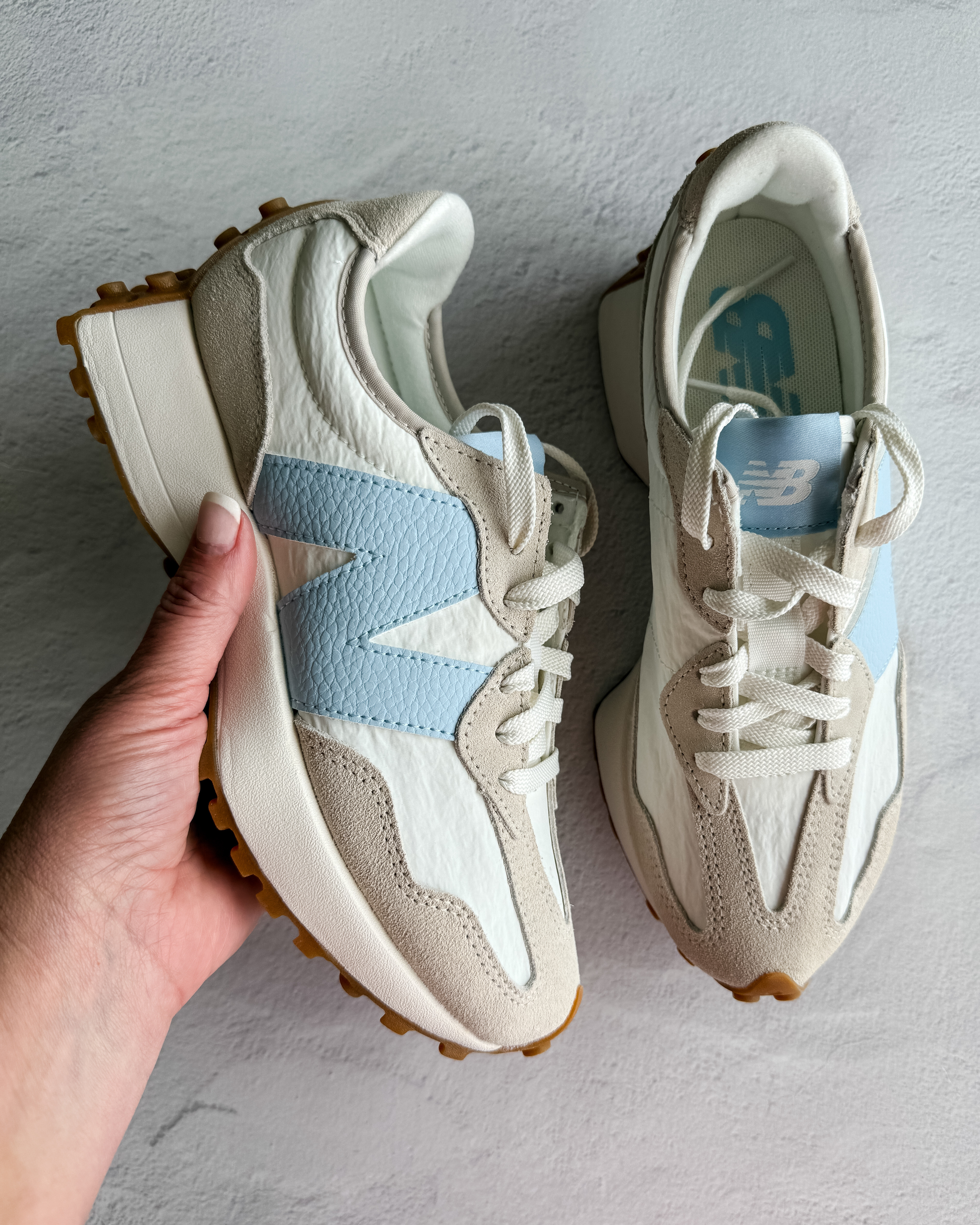 Light Blue Spring New Balance 327.  I size up a 1/2 size. 

 

#LTKFindsUnder100 #LTKShoeCrush