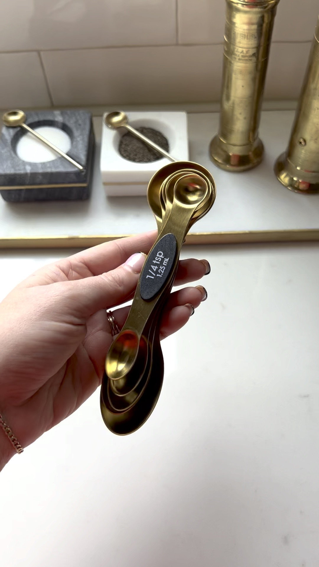 One of my favorite Amazon fines of all time! I absolutely love these magnetic measuring spoons! They’re easy to store and I’ll stay together! They also have two different sized ends so you can use your spoon more than one time if the other side is dirty!

Amazon Home, Amazon, fines, kitchen, decor, gold kitchen, black kitchen, modern kitchen, gift for her, cooking gift, kitchen, essentials, look for less, baking, cooking 

#LTKhome #LTKunder50 #LTKstyletip