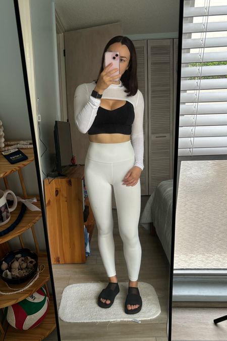 My outfit for reformer Pilates today.  

I wanted something a little edgy but minimalist for my workout wear today.  Who doesn’t love a good black and white Athleisure outfit?

I threw on my alo yoga shrug to add a little more fun and style to this look!  