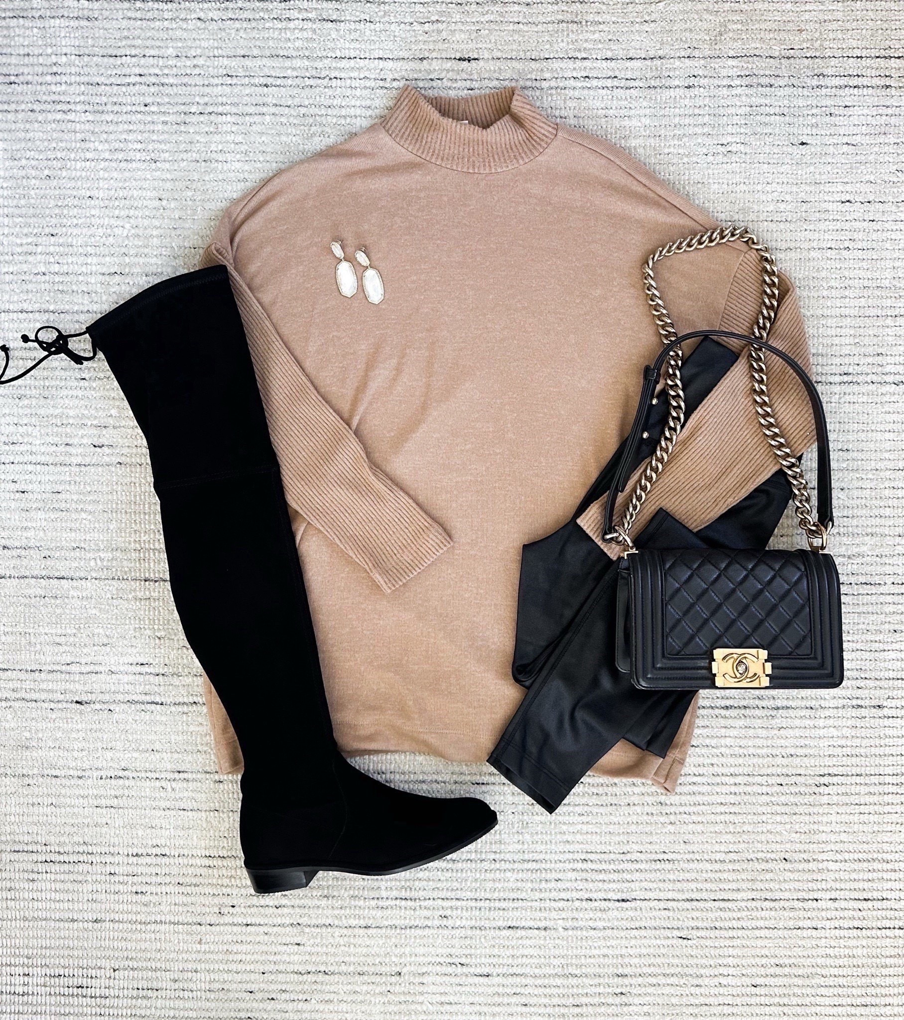 Winter outfit with mockneck sweater paired with faux leather leggings and knee high suede boots. Love this for every day, date night, and more. Sweater and leggings are on major sale! 

#LTKSaleAlert #LTKootd #LTKSeasonal