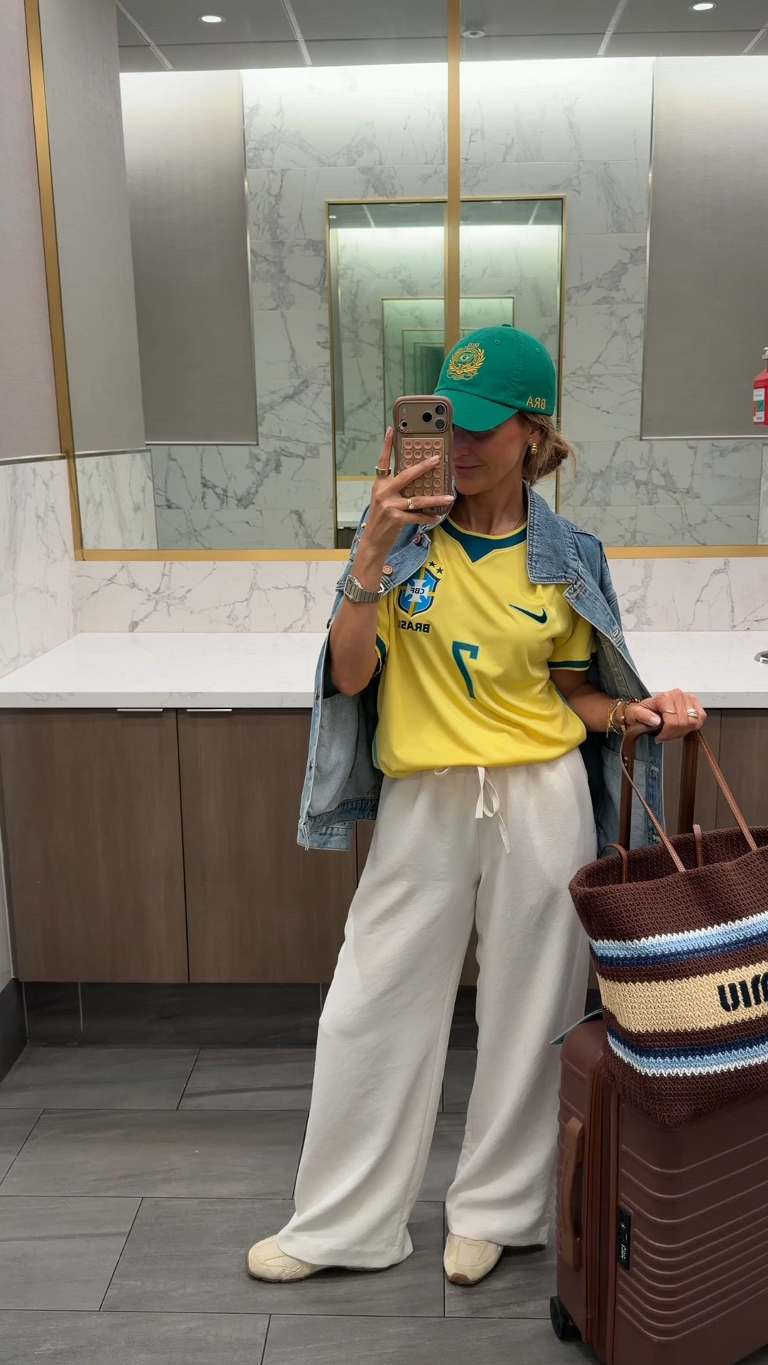 The airport outfit I never shared! Wearing my lodge pants (size small regular length) with my Brasil jersey medium and quince denim jacket in small 
My hat is Ralph Lauren and stocked!

#LTKootd #LTKgrwm #LTKTravel