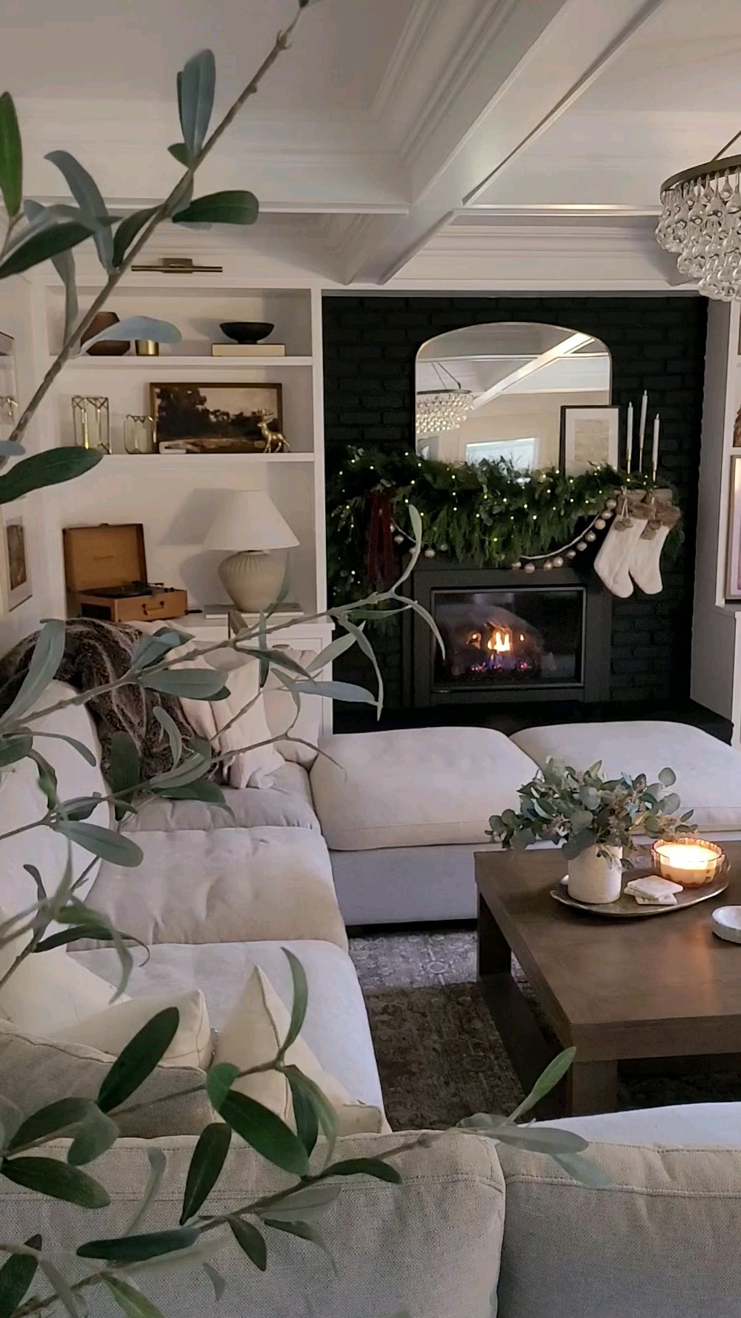 Cozy neutral vibe for our holiday family room - painting our fireplace black was such a fun decision this year in addition to this massive sectional sofa and oversized coffee table!

#LTKWatchNow #LTKHome #LTKHoliday