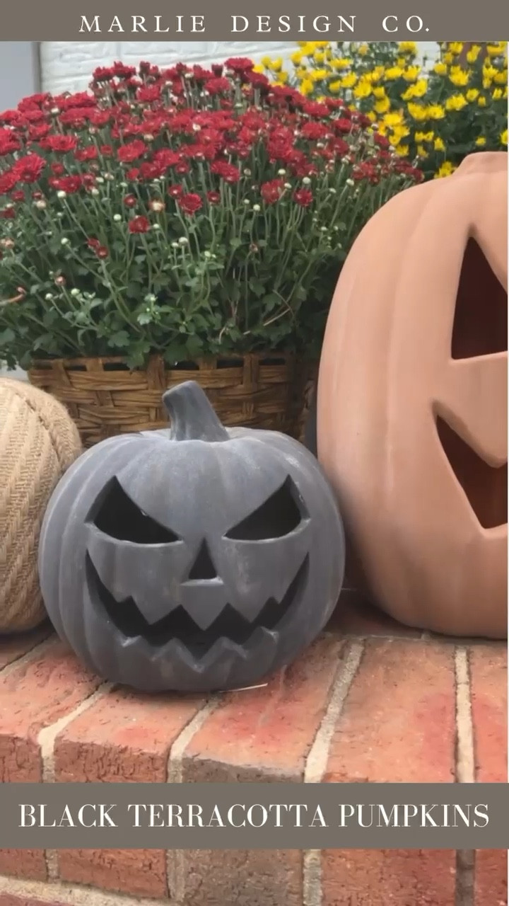 DIY black faux terracotta jack o lantern | black pumpkin | Halloween decor | neutral Halloween decor | jack o lantern | stylish Halloween decor | pottery barn black jack o lanterns | fall | fall decor | Halloween | Halloween decor | stone pumpkins | Halloween porch decor | terracotta jack o lanterns | walmart | walmart find | walmart Halloween decor | spooky Halloween decor | Michael’s | painted pumpkins 

#LTKSeasonal #LTKHalloween #LTKhome