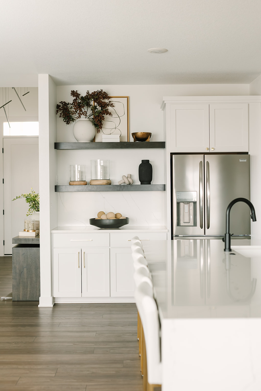 Kitchen shelf decor that mixes neutral, functional pieces with a few pretty accents to make the space feel styled, warm, and thoughtfully layered. 

 #LTKHome