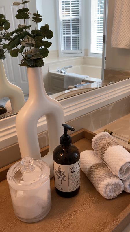Bathroom Accessories | Vase, Faux Eucalyptus, Hand Soap, Glass Canister, Waffle Weave Washcloths

#LTKhome #LTKstyletip #LTKfindsunder50